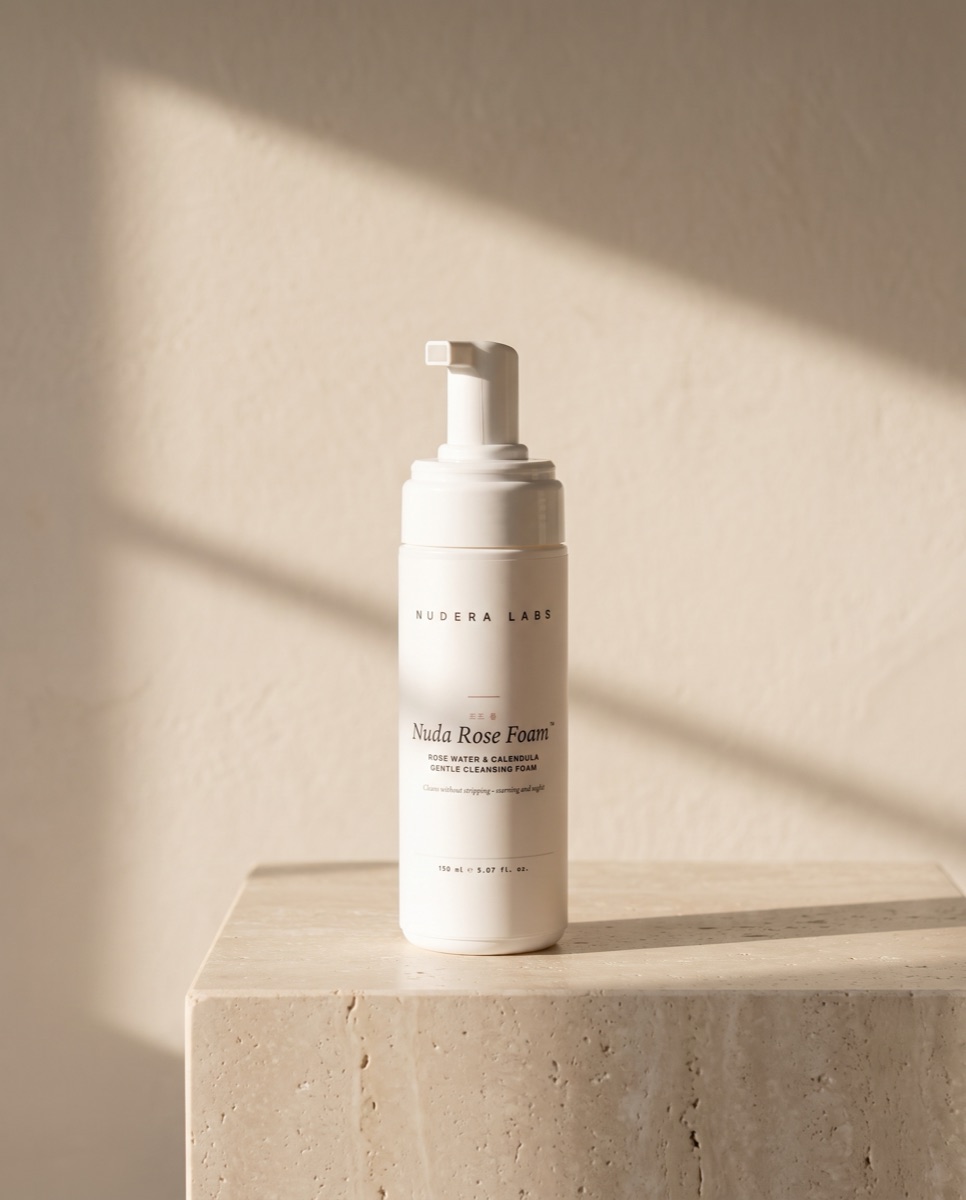 Nuda Rose Foam cleansing foam on travertine